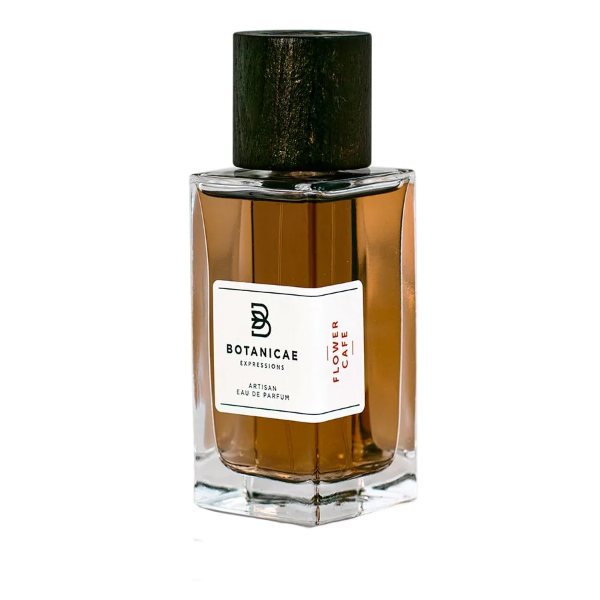 Botanicae - Flower Café Parfumflakon mit honigfarbenem Duft und dunklem Holzverschluss vor weißem Hintergrund
