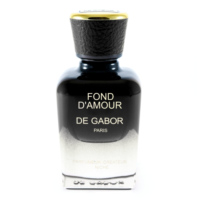 De Gabor - Fond D'Amour Parfumflakon in elegantem Schwarz-Weiß mit goldfarbenem Verschluss auf weißem Hintergrund