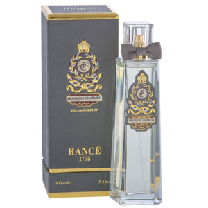Rancé 1795 - Collection Impériale pour Homme - François Charles Parfumflakon mit goldener Verzierung und grauer Schleife neben eleganter Verpackung
