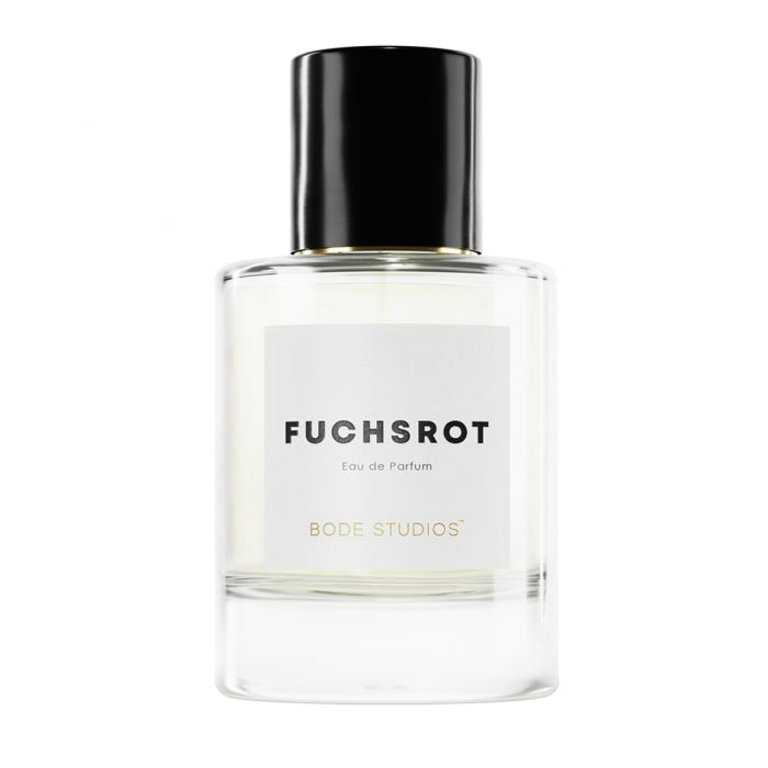 Bodé Studios - Fuchsrot Parfumflakon mit klarem Glas und schwarzem Verschluss vor weißem Hintergrund
