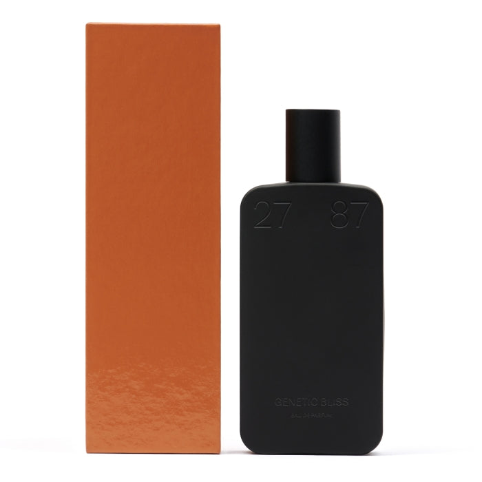27 87 Perfumes - Next Generation - genetic bliss schwarzer Flakon mit dezenter Prägung neben brauner Verpackung vor weißem Hintergrund