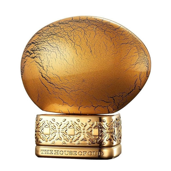 THoO - Golden Powder Parfumflakon in goldener, strukturierter Form mit filigranen Mustern und elegantem Design vor weißem Hintergrund