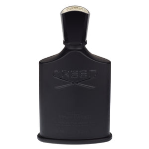Creed - Green Irish Tweed Parfumflakon in elegantem dunklen Design vor klarem, weißem Hintergrund
