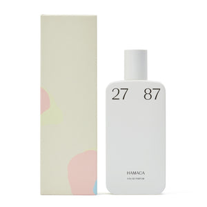 27 87 Perfumes - Hamaca Parfumflakon mit mattem weißen Design und minimalistischer Typografie neben pastellfarbener Verpackung