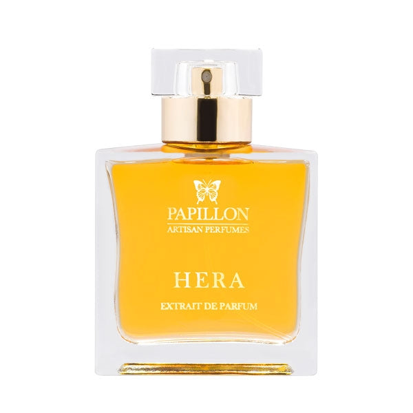 Papillon Perfumery - Hera klarer Glasflakon mit goldenem Verschluss und bernsteinfarbener Flüssigkeit vor weißem Hintergrund