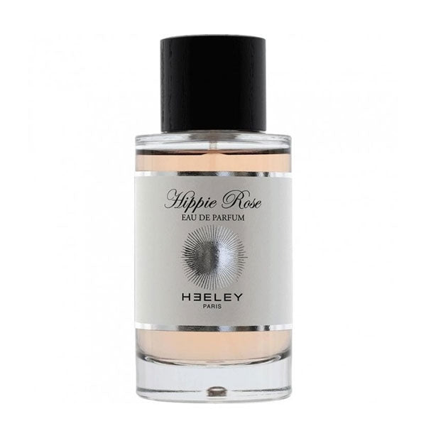 Heeley - Hippie Rose Parfumflakon mit schwarzem Holzverschluss und schlichtem weißem Etikett vor weißem Hintergrund