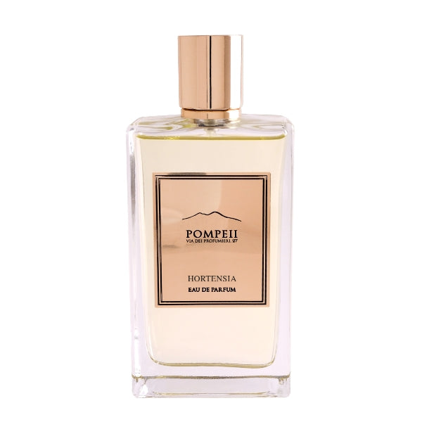 Pompeii - Hortensia Parfumflakon mit klarem Glas und roségoldenem Etikett vor weißem Hintergrund