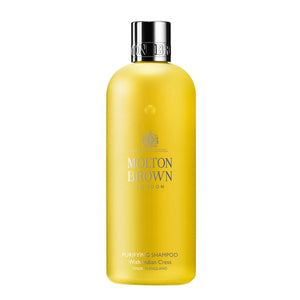 Molton Brown - Indian Cress Purifying Shampoo für gepflegtes Haar in elegantem, gelbem Flakon mit Silberverschluss