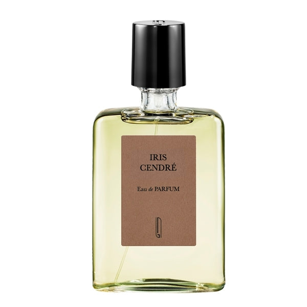 Naomi Goodsir - Iris Cendré Parfumflakon mit hellgelber Flüssigkeit und schwarzem Verschluss vor weißem Hintergrund