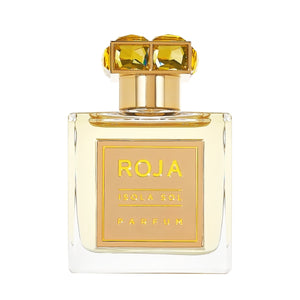 Roja Parfums - Isola Sol edler Flakon mit goldfarbenem Verschluss und warmen Bernsteinakzenten vor weißem Hintergrund