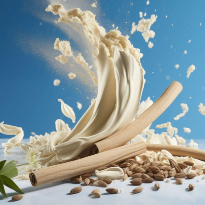 Perroy Parfum - Ivory Sky cremige Duftwolke mit Mandelaromen und Zimtstangen vor klarem blauem Hintergrund