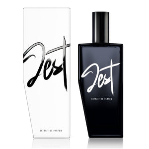 Andrea Maack Parfums - Jest eleganter schwarzer Parfümflakon mit weißer Schrift und passender Verpackung vor weißem Hintergrund