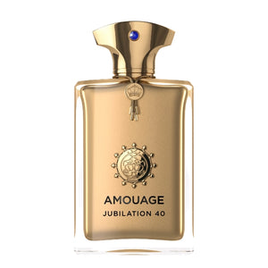 Amouage - Jubilation 40 Parfumflakon in elegantem goldfarbenem Design mit blauem Schmuckstein am Verschluss