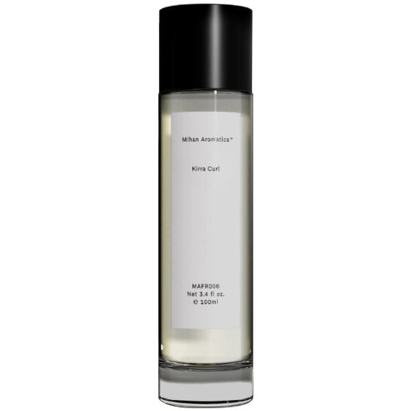 Mihan Aromatics - Kirra Curl zeigt eleganten Zylinderflakon mit schwarzem Deckel und schlichtem weißem Etikett