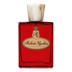 Roberto Ugolini - Kitten Heel Parfumflakon in rotem Glas mit elfenbeinfarbenem Verschluss vor weißem Hintergrund