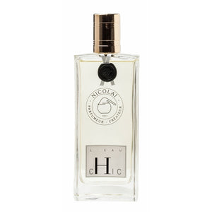 Nicolaï - L’Eau Chic Parfumflakon mit klarem Glas und goldenem Verschluss, elegant und schlicht gestaltet