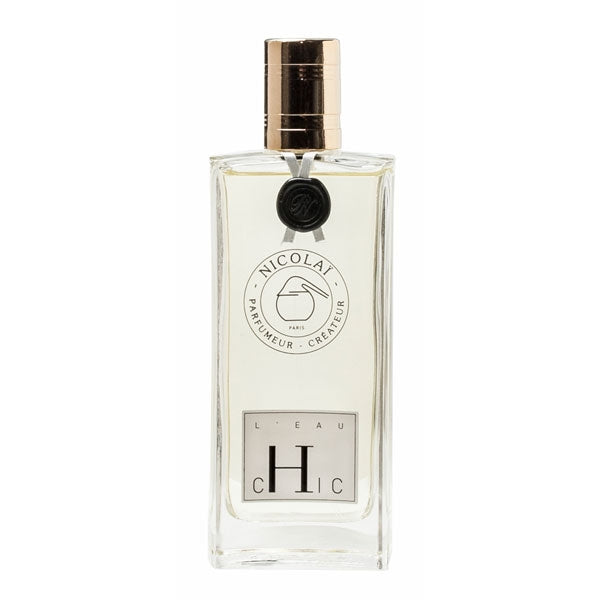 Nicolaï - L’Eau Chic Parfumflakon mit klarem Glas und goldenem Verschluss, elegant und schlicht gestaltet