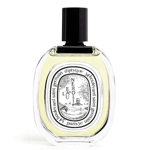 Diptyque - L'Eau de Neroli Parfumflakon mit klarer ovaler Form und schwarzem Verschluss vor weißem Hintergrund