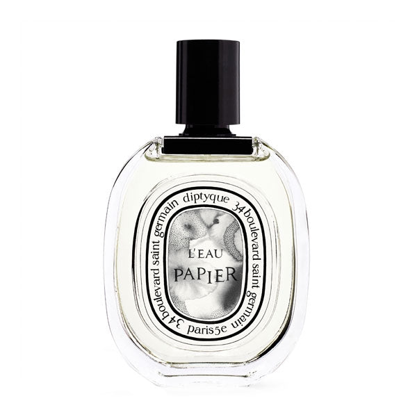 Diptyque - L'Eau Papier Parfümflakon mit klarer Flüssigkeit und schwarzem Verschluss auf weißem Hintergrund