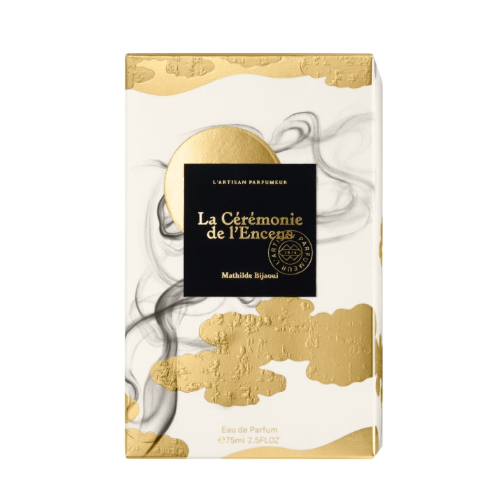L'Artisan Parfumeur - L´Esprit du Parfum - La Cérémonie de l'Encens Verpackung mit goldenen Akzenten und rauchigem Design auf weißem Hintergrund
