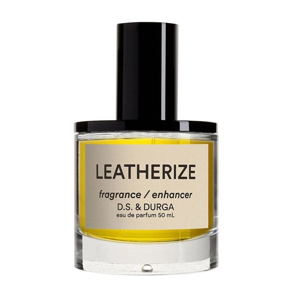 D.S. & Durga - Leatherize eleganter klarer Flakon mit gelbem Inhalt und schwarzem Verschluss vor weißem Hintergrund