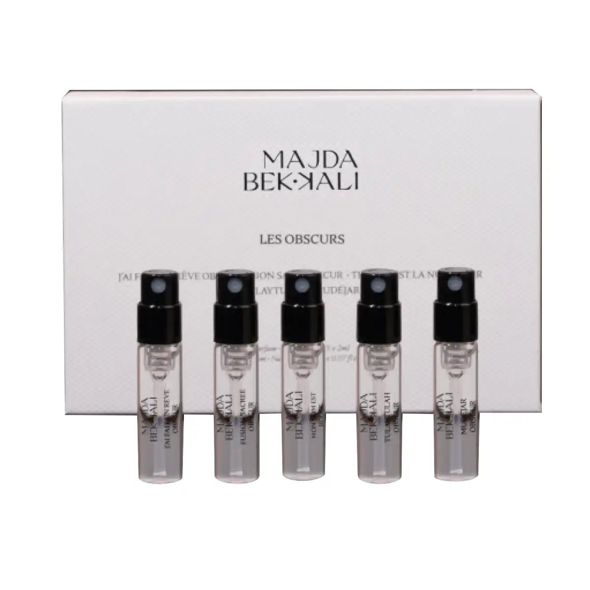 Majda Bekkali - Discovery Set - Les Obscurs mit fünf kleinen Spray-Duftproben vor weißer Verpackung