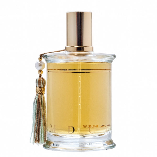 Parfums MDCI Paris - Les Indes Galantes klarer Duftflakon mit goldener Kappe und dekorativer Quaste vor weißem Hintergrund