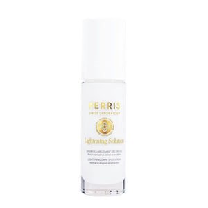 Perris Swiss Laboratory - Lightening Solution - Lightening Dark Spot Serum in weißer Flasche mit goldener Schrift