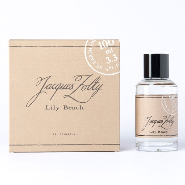 Jacques Zolty - Original Collection - Lily Beach Flakon mit schwarzem Verschluss und Verpackung in Beige vor weißem Hintergrund