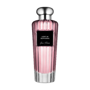 Jean Poivre - Lost in Euphoria Parfumflakon in zartem Rosa mit geriffeltem Glas und silbernem Verschluss elegant inszeniert