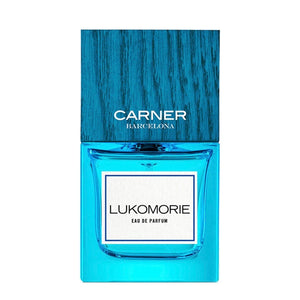 Carner Barcelona - Dream Collection - Lukomorie Parfumflakon in kräftigem Blau mit Holzoptikverschluss vor weißem Hintergrund