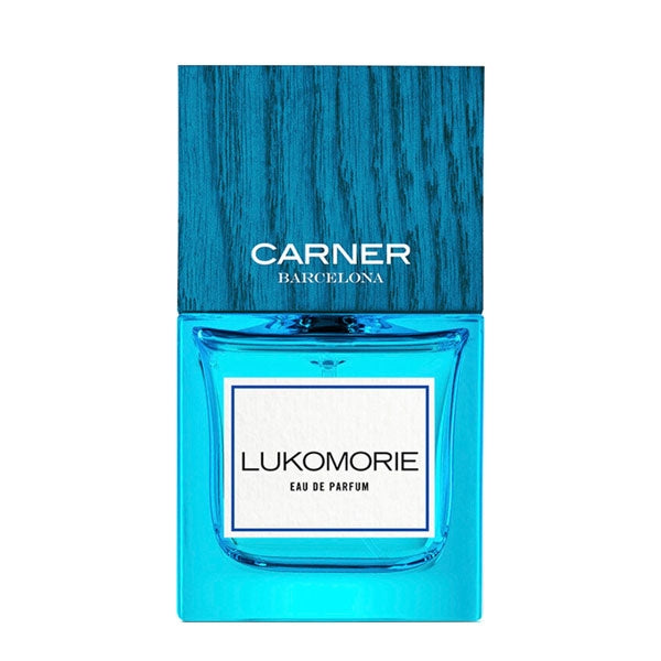 Carner Barcelona - Dream Collection - Lukomorie Parfumflakon in kräftigem Blau mit Holzoptikverschluss vor weißem Hintergrund