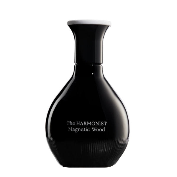 The Harmonist - Magnetic Wood Parfumflakon in tiefschwarzem Design mit schlankem Hals und weißem Deckel vor weißem Hintergrund