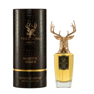 Pana Dora Sweden - Majestic Amber Flakon mit goldenem Hirschkopf neben edler brauner Verpackung mit Muster