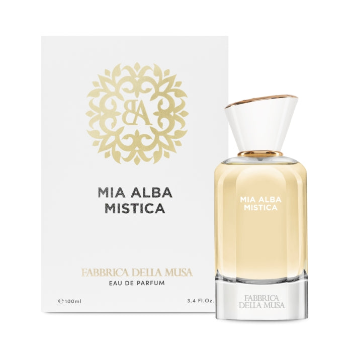 Fabbrica della Musa - Mia Alba Mistica Flakon mit goldgelber Flüssigkeit und weiß-goldenem Deckel vor weißer Verpackung
