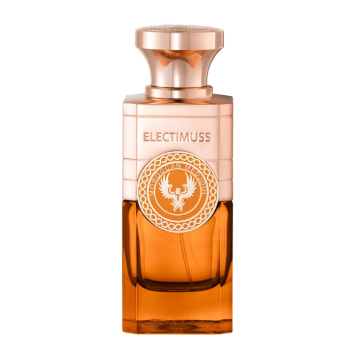Electimuss - Moroccan Medjool Parfumflakon mit elegantem, goldbraunem Glas und dekorativem runden Emblem auf der Frontseite