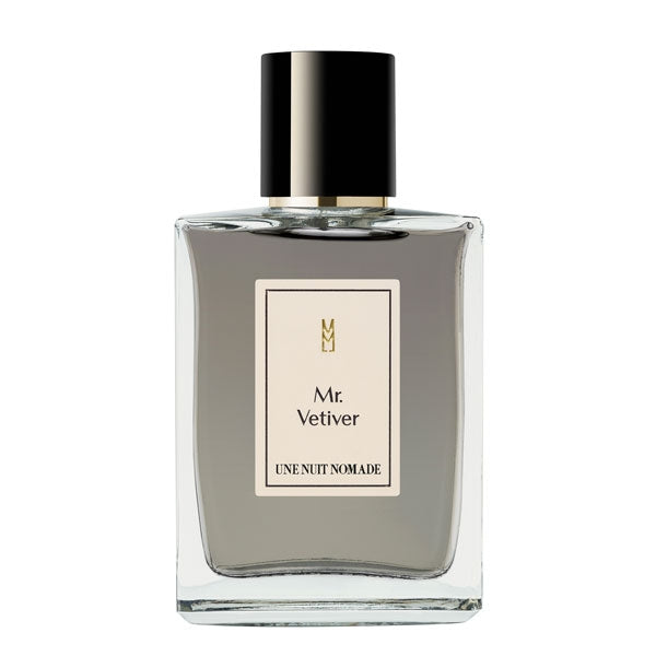 Une Nuit Nomade - Une Nuit a Bali - Mr. Vetiver Parfumflakon mit schlichtem Design und dunkelgrauer Flüssigkeit vor weißem Hintergrund