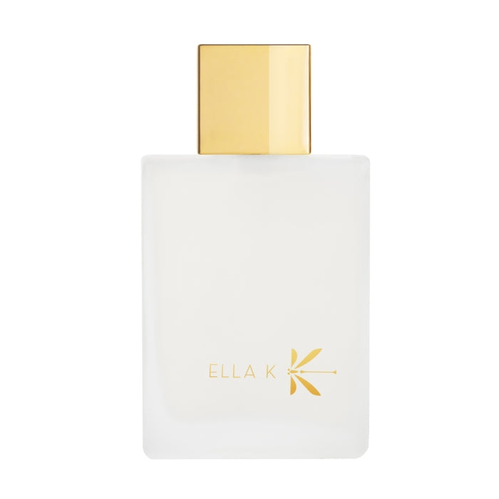 Ella K - Musc K zeigt minimalistischen, weißen Glasflakon mit goldenem Verschluss und dezentem Markenschriftzug