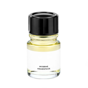 Headspace - Myrrhe Parfumflakon mit hellem Inhalt und schwarzem Deckel vor weißem Hintergrund