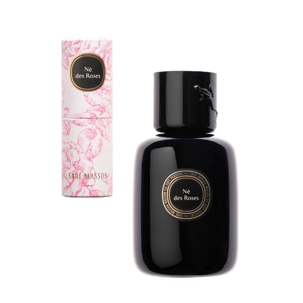 Sabé Masson - Né des Roses - La Rencontre elegante schwarze Parfumflasche mit floral dekorierter Verpackung auf weißem Hintergrund