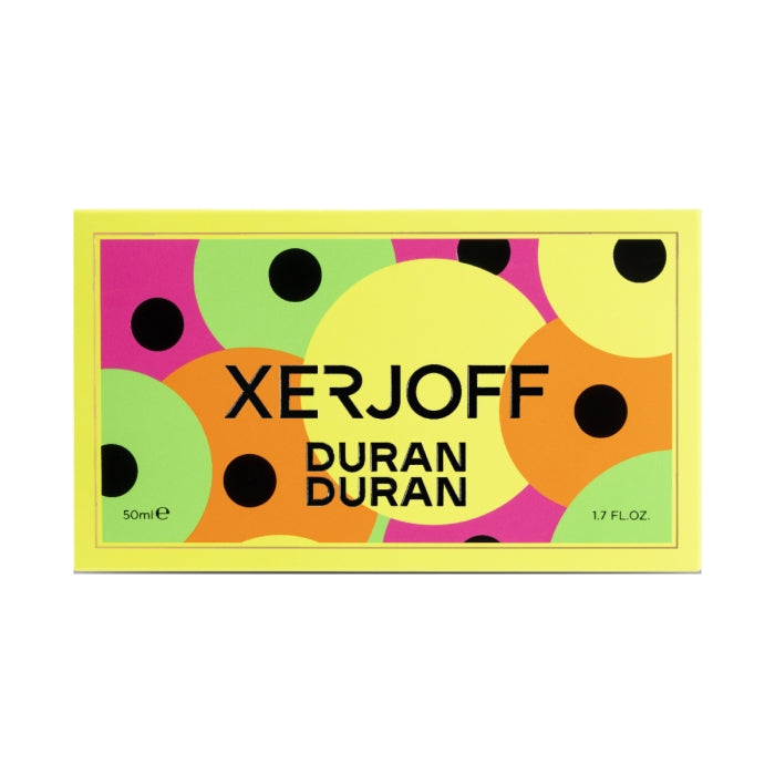 Xerjoff - Blends - Duran Duran - NeoRio / Yellow Verpackung mit bunten Kreisen in Gelb, Grün, Orange und Pink auf hellem Hintergrund