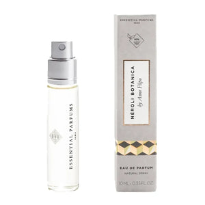 Essential Parfums - Néroli Botanica zarter Sprayflakon mit goldenen Akzenten und eleganter Verpackung auf weißem Hintergrund