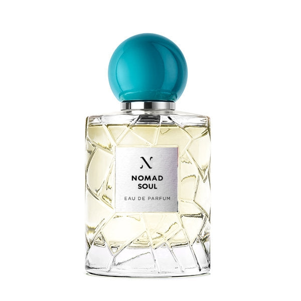Les Sœurs de Noé - Nomad Soul Parfumflakon mit türkisfarbenem Verschluss und strukturiertem Glas vor weißem Hintergrund