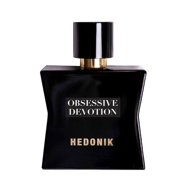 Hedonik by Francesca Bianchi - Obsessive Devotion schwarzer eleganter Flakon mit goldfarbenem Verschluss vor weißem Hintergrund
