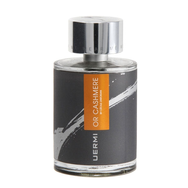 UERMI - OR CASHMERE Parfumflakon mit anthrazitfarbenem Etikett und silbernem Verschluss vor weißem Hintergrund