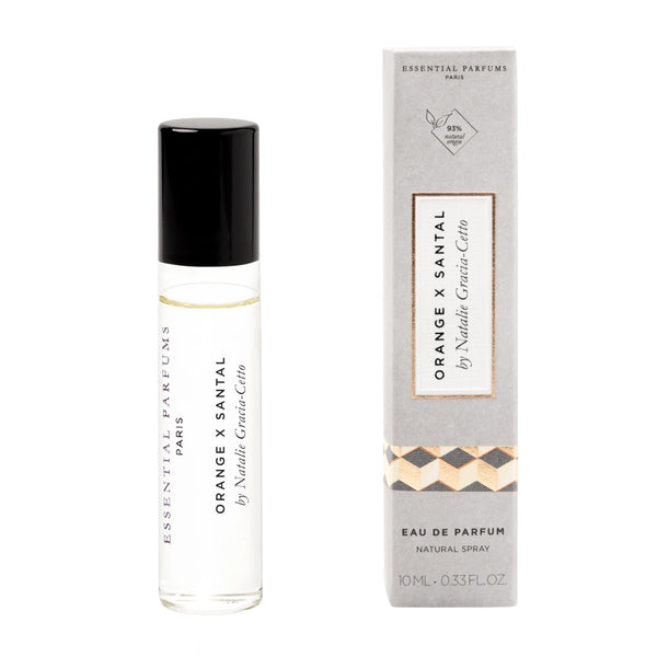 Essential Parfums - Orange X Santal Roll-On Flakon mit schwarzem Deckel und grau-beiger Verpackung vor weißem Hintergrund