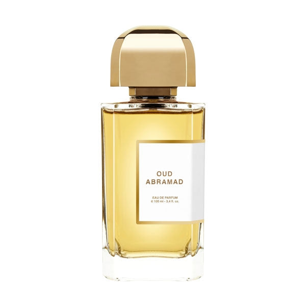 bdk Parfums - Collection Matières - Oud Abramad Parfumflakon mit goldfarbenem Verschluss und bernsteinfarbenem Duft vor weißem Hintergrund