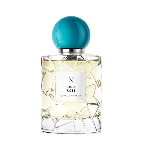 Les Sœurs de Noé - Oud Rose Parfumflakon mit kristallinem Glasdesign und markantem türkisfarbenem runden Verschluss