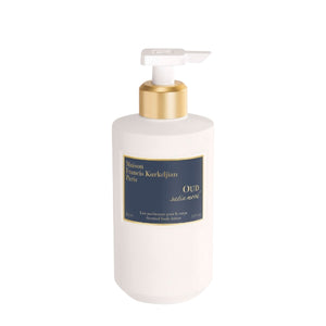 Maison Francis Kurkdjian Paris - Oud Satin Mood - Body Lotion mit goldfarbenem Verschluss und blauem Etikett auf weißem Flakon