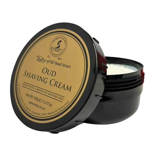 Taylor of Old Bond Street - Oud Shaving Cream in schwarzem Tiegel mit goldfarbenem Etikett und offener Cremeschicht